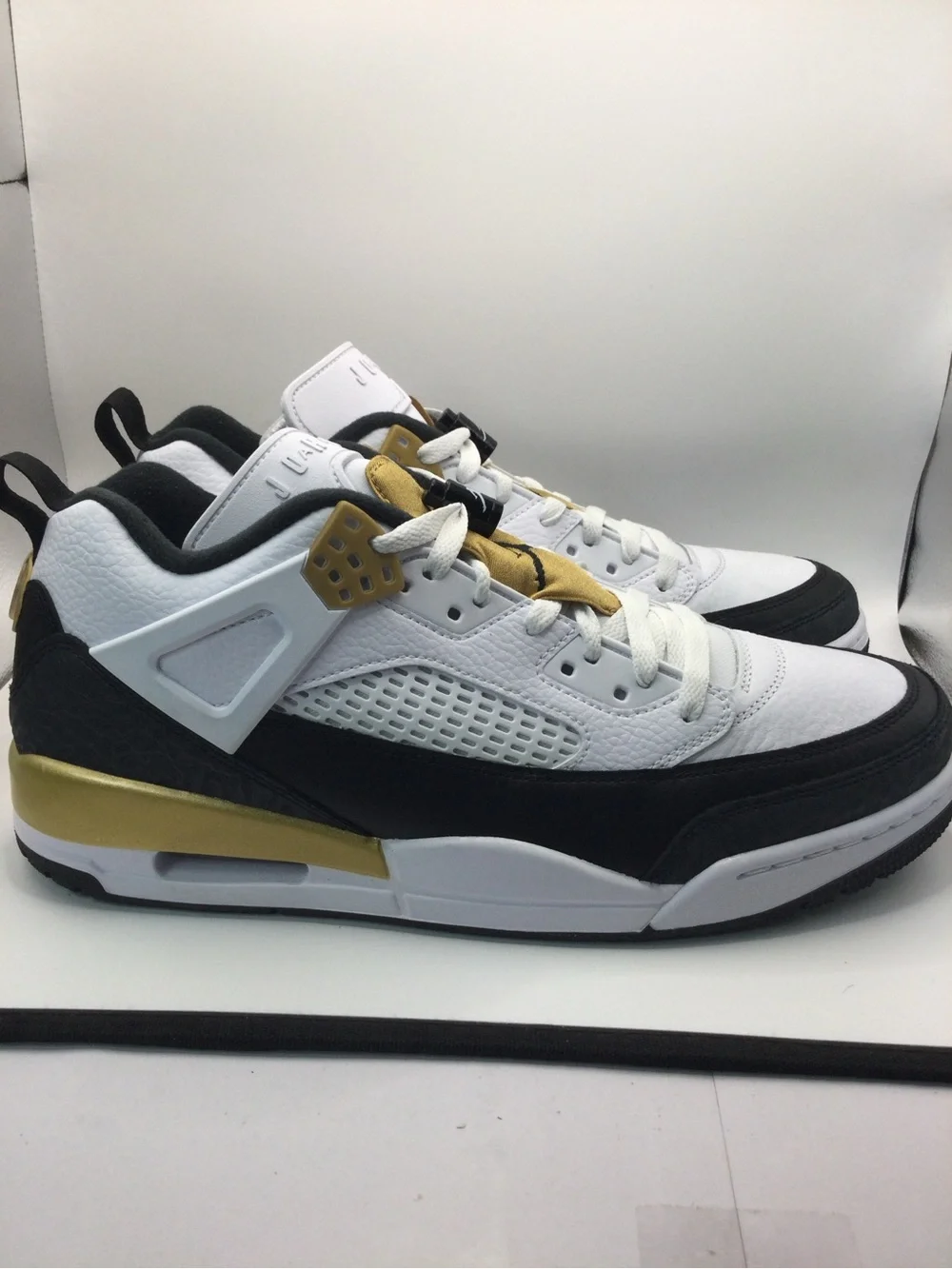 Jordan Low-Top Sneakers - White, Black & Gold